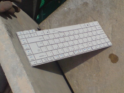 Broken Aspire Keyboard drying in the sun