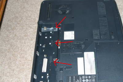 Aspire 5315 Keyboard Removal, 3 black screws (arrowed)